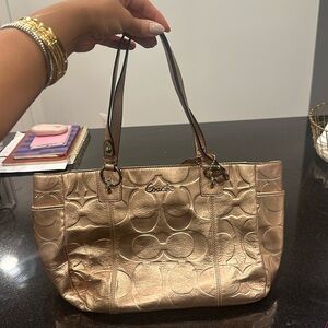 Coach gold purse